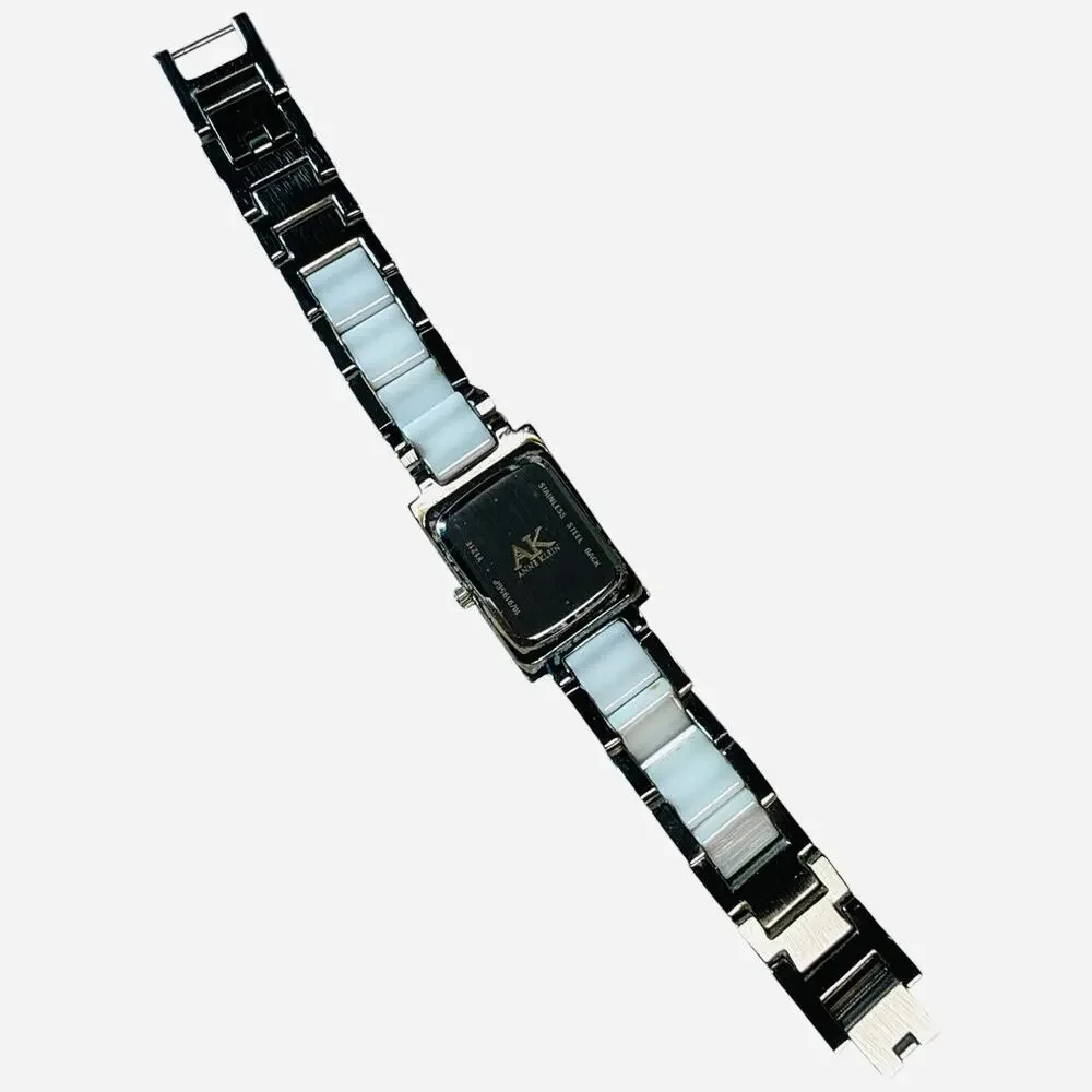 Anne Klein Women's Silver Tone Watch White Ceramic Crystal Face 10/9195GP